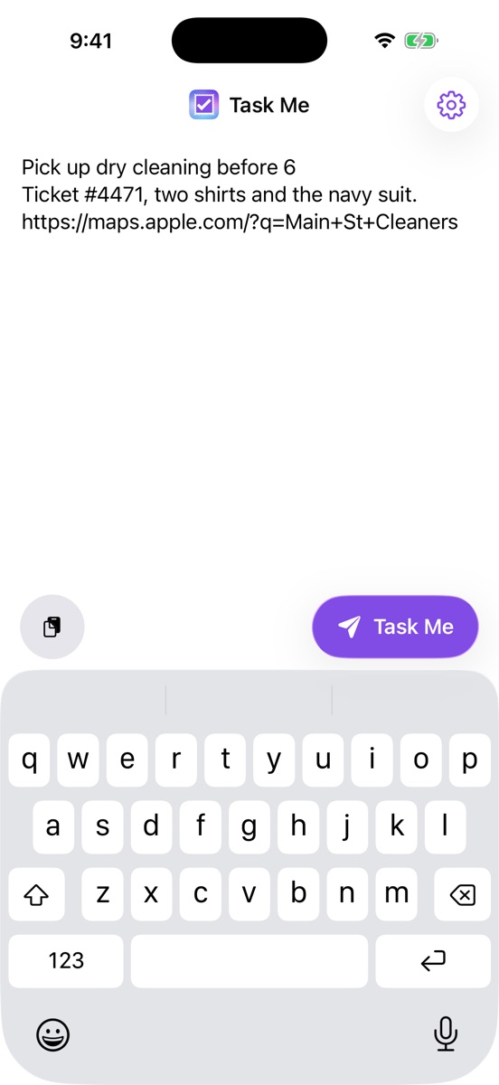 The Task Me compose screen: the app icon and name at the top, a note about picking up dry cleaning, a paste button and a purple Task Me send button above the keyboard.